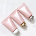 Hot Sale pink Cream Squeeze Tubes Gold Silver White Cover 60ml Cleanser Tube Packaging Plastic Cosmetic Tube With Screw Lids