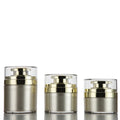 Wholesale 30ml 50ml 70ml Gold Empty Round Shape Plastic Airless Cream Jar with Pump for Skincare Packaging