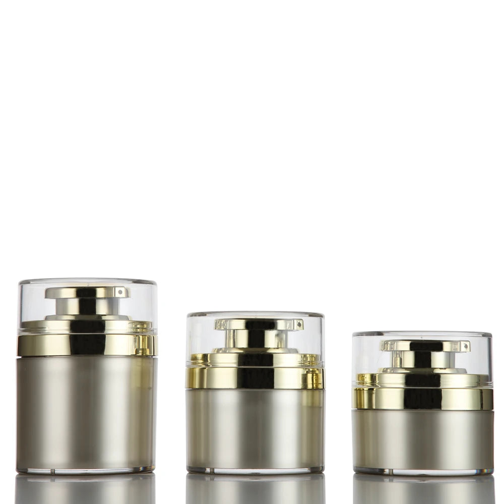 Wholesale 30ml 50ml 70ml Gold Empty Round Shape Plastic Airless Cream Jar with Pump for Skincare Packaging