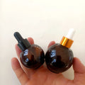 Empty for Shape Circular Luxury Wholesale Amber Clear Glass Dropper Bottle with Screen Printing for Essential Oil 30ml/60ml