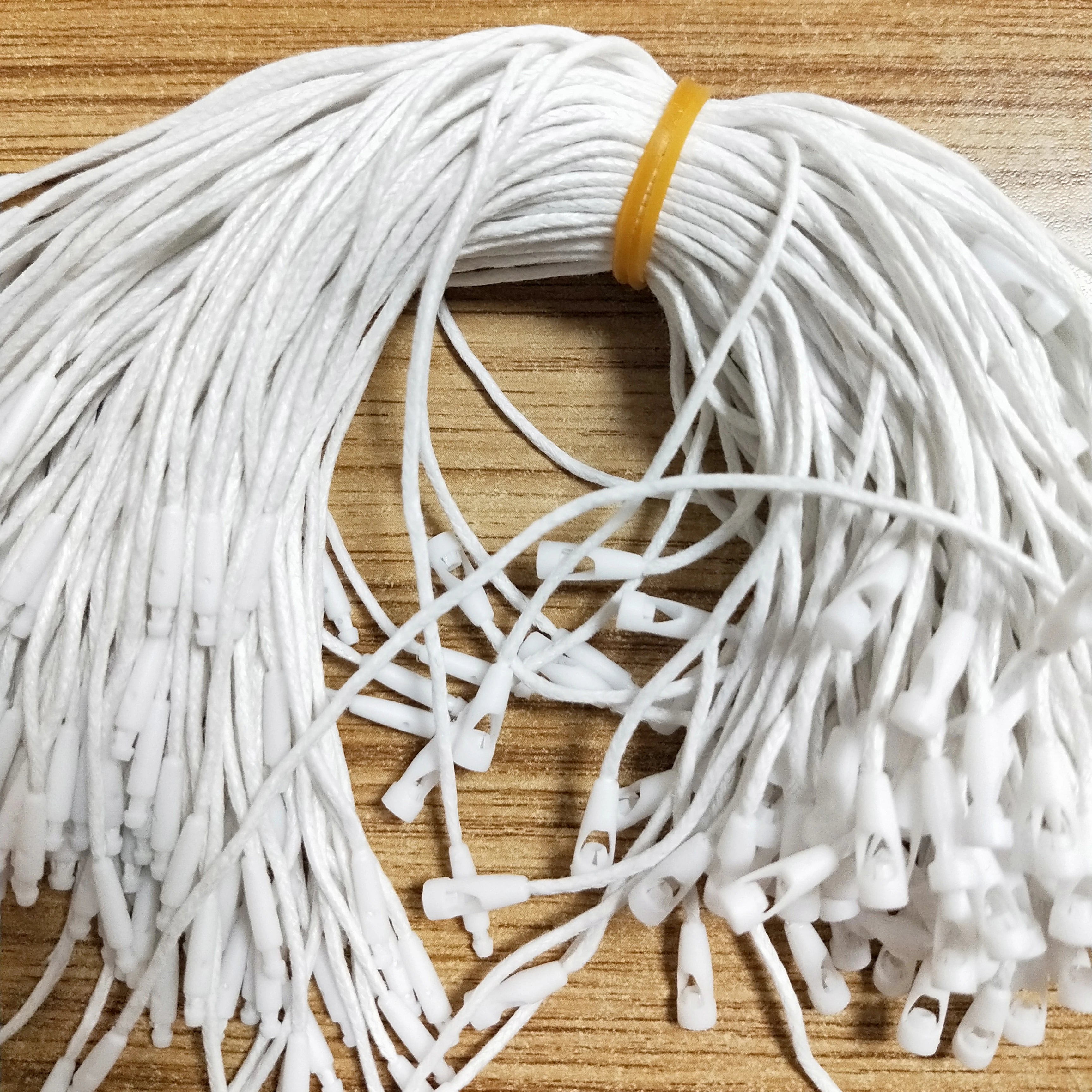 2023 Custom Wholesale Cheap Polyester Garment hang Tag String Fastener Plastic Seal Lock String for Clothing Fastener Line