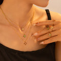 YF6115 Stainless Steel Niche Jewelry Set 18k Gold Plated Four Petal Flower Colored Zircon Pendant Necklace Open Ring Set