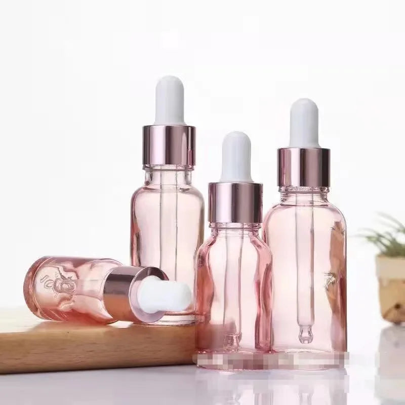 Wholesale 15ml 30ml 50ml Pink Glass Round Dropper Bottles with Screen Printing for Essential Oil Serum Skin Hair Care