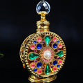 Wholesale 15ml Gold Green Pink Blue Dubai Arab Shaped Glass Metal Essential Oil Perfume Bottle