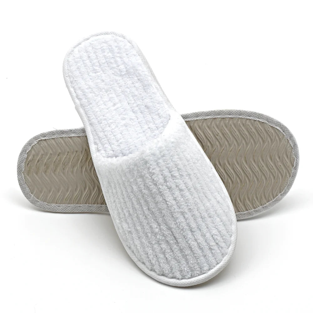 Stocked Coral Fleece Guest Slippers for Spa Hotel Disposable Soft Slippers