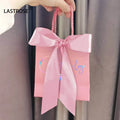 Wholesale Gift pink Paper Bag with Ribbon Bow pink Black Shopping Bags with Holographic logo