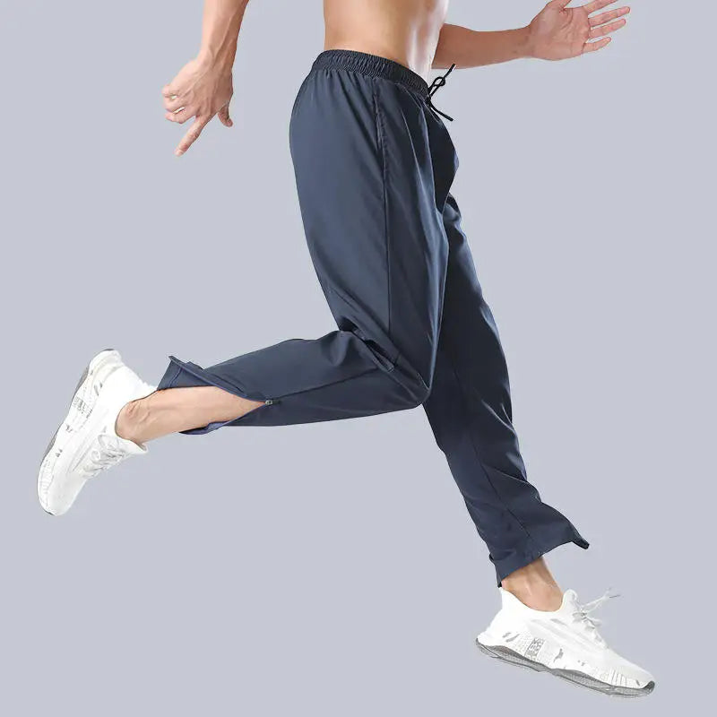 Wholesale Mens Elastic Waist Sports Pants Custom Logo Sweat Pants With Zip Bottom Leg Opening Mens Joggers