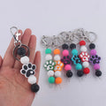 Various Color Cheap Custom Doll Rechargeable Eco-Friendly BPA Free Soft Metal Beaded Coin Holder Keychain for Gift