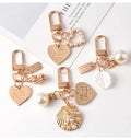 Lovely Mozto Hiano Pearl Shell Key Chain Pendant Lover Trinket Shell Conch Pearl Keychain Girl for Bag Accessories
