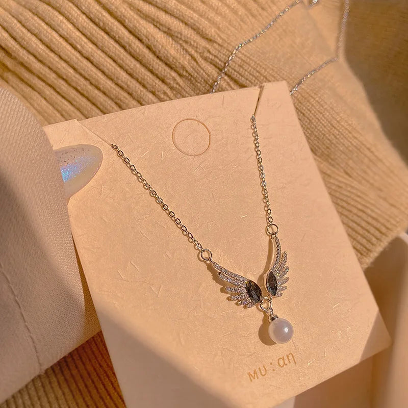 Female Niche Design Sense Zirconia Necklace  Beautiful Little Wings Pearl Pendant Fashion Stainless Steel Jewelry
