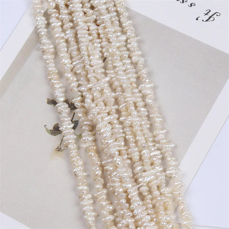 Wholesaler 2-3mm Natural White Keshi Freshwater Pearl Strands
