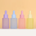 Popular Empty 30ml Matte pink Purple Flat Shoulder Essential Oil Glass Dropper Bottles for Skin Care