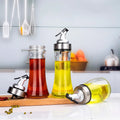 2023 Modern 6Oz Glass Oil and Vinegar Dispenser Clear Glass Oil Bottle with Pouring Spouts Printed Design for Olive Oil