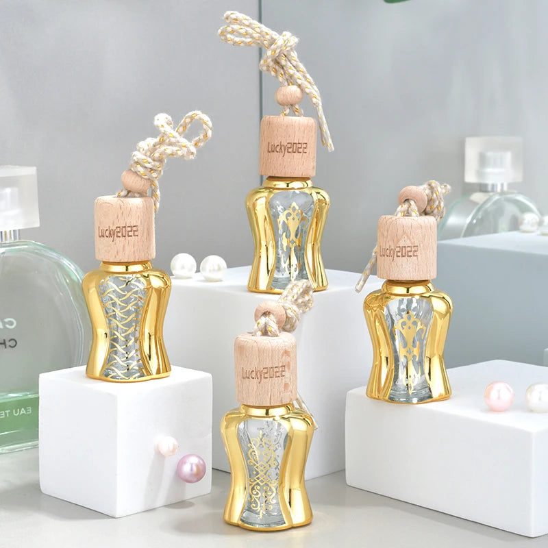 Luxury Gold Glass Aromatherapy Bottle Car Perfume Hanging Bottle with Wooden Screw Cap Available for Customized logo