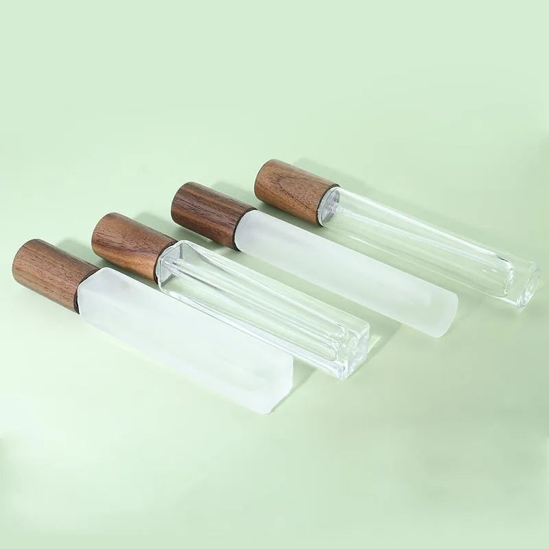 Wholesale Custom 10ml Wood/Silver Clear Portable Mini Perfume Glass Bottle Empty Cosmetic Packaging Bottles Sample Glass Vials
