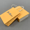 Custom Printed Kraft Paper Shopping Bags with Ribbon Carry Packaging for Women's Clothing Stores Printed with Logos