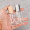 20ml 30ml Cylinder Glass Perfume Dispensing Bottle Empty Refillable with Wooden Lid Pump Sprayer and Fine Mist Sealing Type
