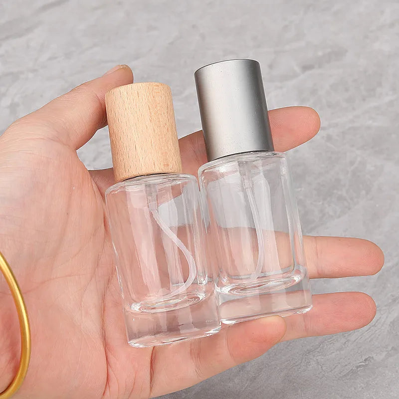 20ml 30ml Cylinder Glass Perfume Dispensing Bottle Empty Refillable with Wooden Lid Pump Sprayer and Fine Mist Sealing Type