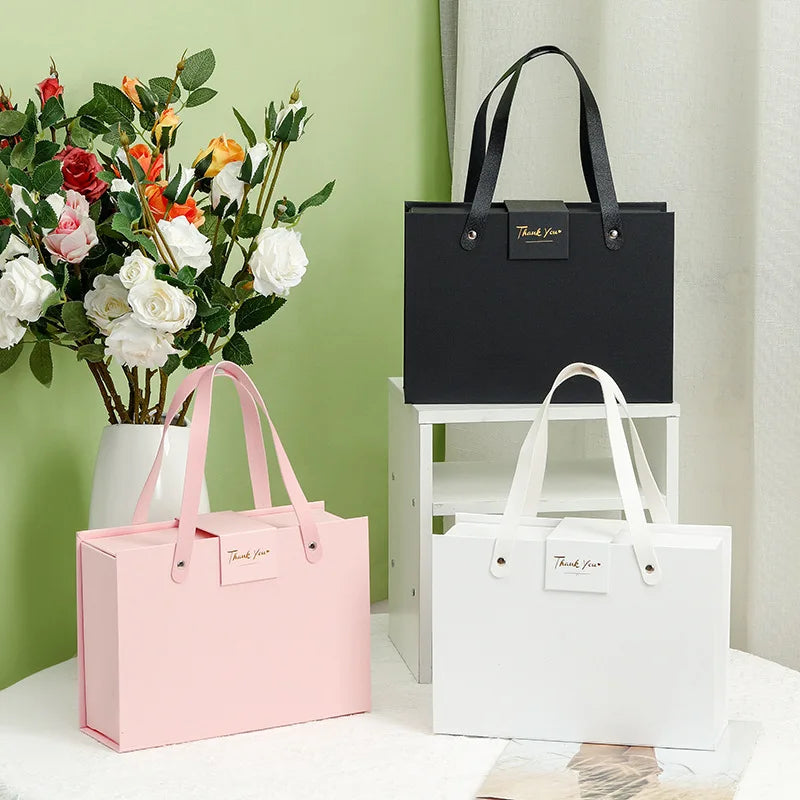 Wholesale Creative Clamshell Perfume Gifts Packaging One-piece Magnetic Cardboard Paper Box with Handle