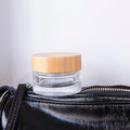 Eco-Friendly White Glass Cosmetic Jars with Bamboo Lid Plastic Cosmetic Jar Packaging for Face Cream and Skin Care Cream