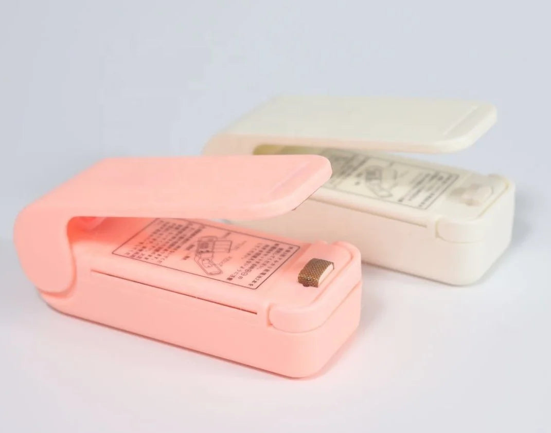 Hot Selling Kitchen Portable Manual Plastic Bags Sealers Vacuum Food Sealers Mini Heat Sealing Machines