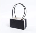 Boutique Kraft Paper Bag Plastic Pipe Handle Waterproof Flower Basket Design for Food Packing Art Coated Paper Carry Bags Logo
