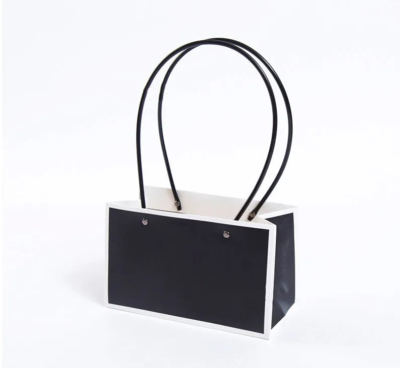 Boutique Kraft Paper Bag Plastic Pipe Handle Waterproof Flower Basket Design for Food Packing Art Coated Paper Carry Bags Logo