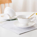 Ceramic Supplier Bulk Custom Logo Minimalist Pure White Gold Rim Bone China Tea Coffee Cup and Saucer Set for Afternoon Tea