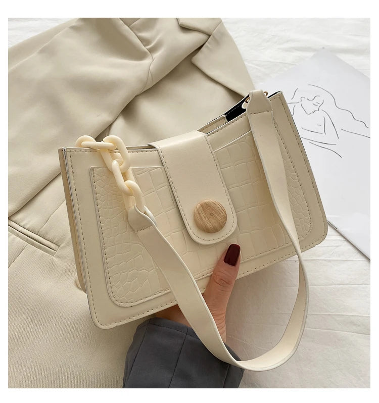 2023 Textured Decoration Solid Color One Shoulder Lightweight Fashion Trend Beautiful Versatile Women'S Handheld Shoulder Bag