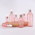 Wholesale 5ml 10ml 15ml 20ml 30ml 50ml 100 ml pink  Glass Essential Oil Dropper Bottle with Rose Gold Aluminum Cap