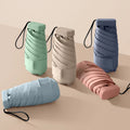 OEM Customizable Logo Mini Portable UV Umbrella Pouch 8K/6K Foldable Pocket for Travel Made in China