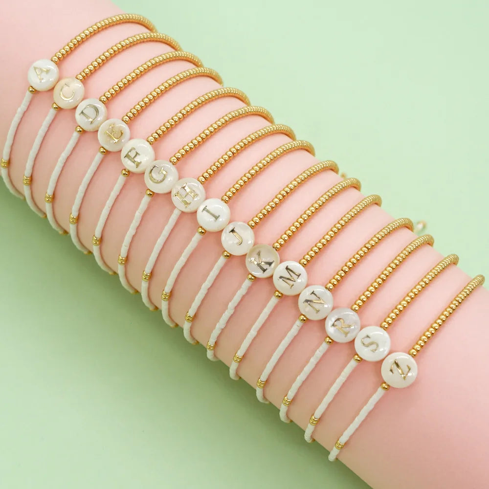 Simple Ins Fashion Designer Natural Shell Letter Gold Bracelet Man Seed Beads Adjustable Woven Friendship Couple Bracelet Woman