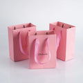 Custom Printed Luxury Boutique Pink Paper Shopping Bags with Handle for Jewelry Packaging