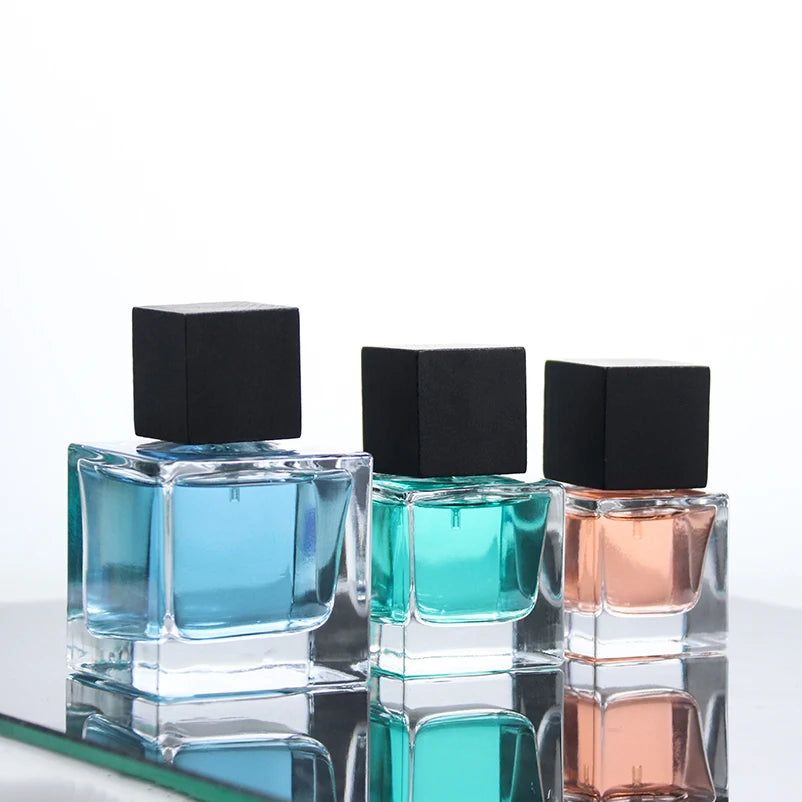 Deluxe New Design square 30ml 50ml 100ml Empty Spray Perfume Oil Bottle Glass with Lid
