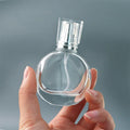 Zhejiang Hangzhou Best Seller Flat Round Perfume Refillable Spray 25ml Glass Perfume Bottles in China