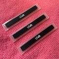 Transparent Background Sewing on PVC Rubber Labelfadeless Color Rubber Clothing Tag With Sewing Holes