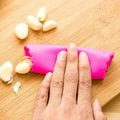 Hot Sale 3 Color Cooking Kitchen Gadget Easy Clean Food Grade Silicone Manual Garlic Peeler 2 in 1 Garlic Press Mincer