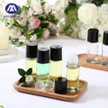 Mingxin Transparent 6ml Roll-On Vial Refillable Clear Travel Perfume Essential Oil Bottle with Round Shape and Dropper Seal