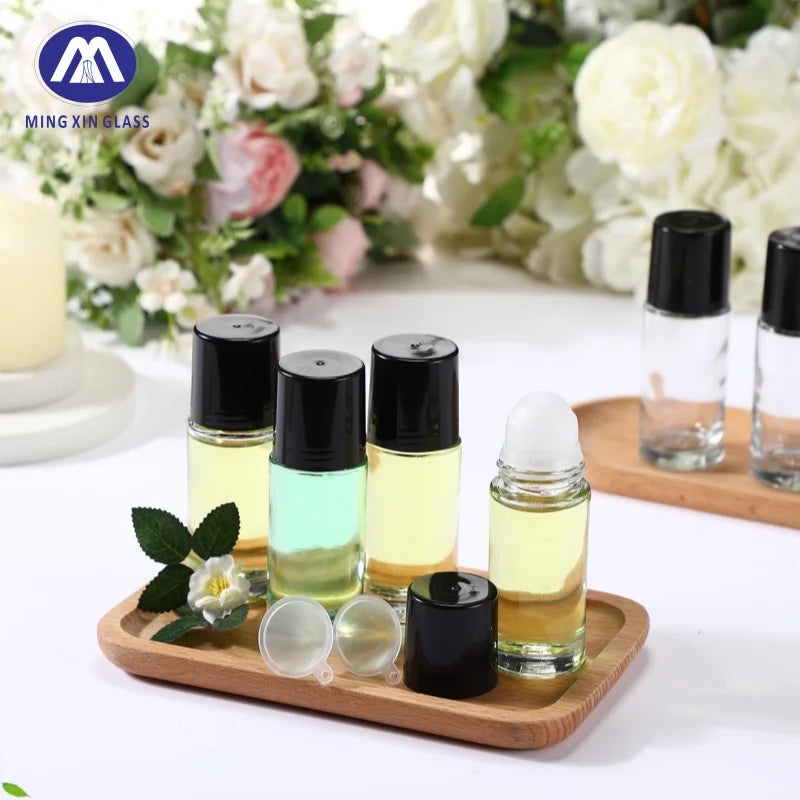 Mingxin Transparent 6ml Roll-On Vial Refillable Clear Travel Perfume Essential Oil Bottle with Round Shape and Dropper Seal