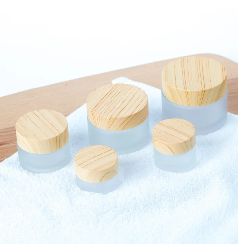 High Quality Custom 5g 10g 30g 50g Frosted Cosmetic Glass Jars With Wood Grain Lid