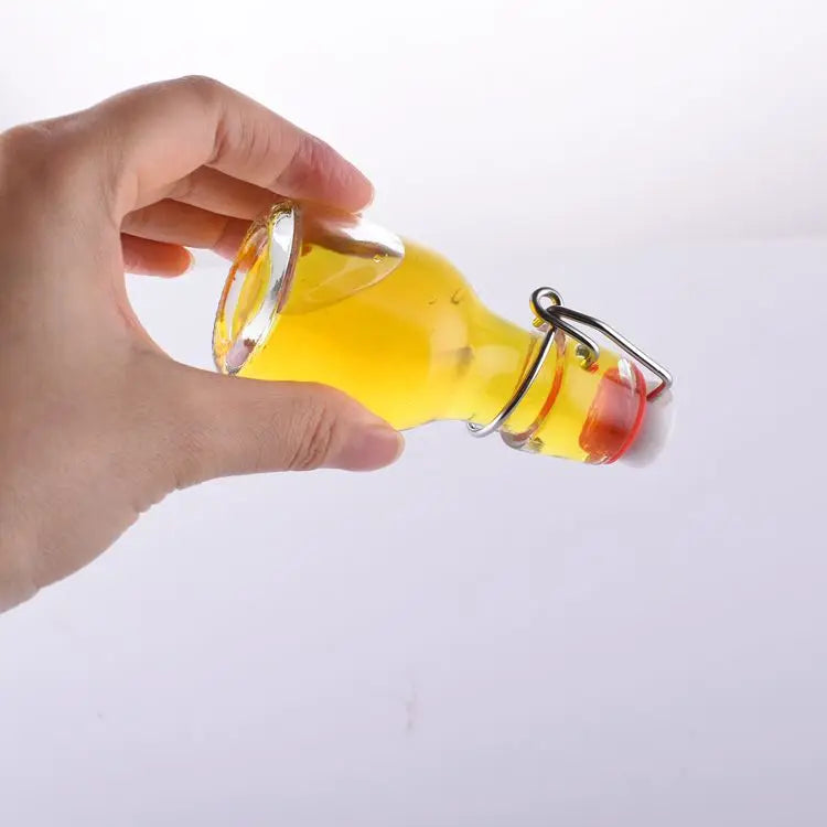 Mini 60ml Glass Juice Bottles with Crown Cap & Swing Top Stoppers Round Shape for Screen Printing MOQ 100pcs