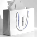Gift Bag Ins Wind Simple Packaging White Cardboard Carry-on Paper Bag Shopping Mall Advertising Shopping Clothing Shoes Box Bag