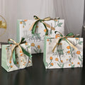 Custom Printed Paper Bags Luxury White Cardboard Gift Bag With Ribbon Bow for Shopping Bag With Your Own Logo
