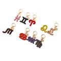 Stock 12 Animal Metal Keychain Full Crystal Rhinestone Blingbling Diamond Rechargeable Car Schoolbag Zodiac Keychain Doll