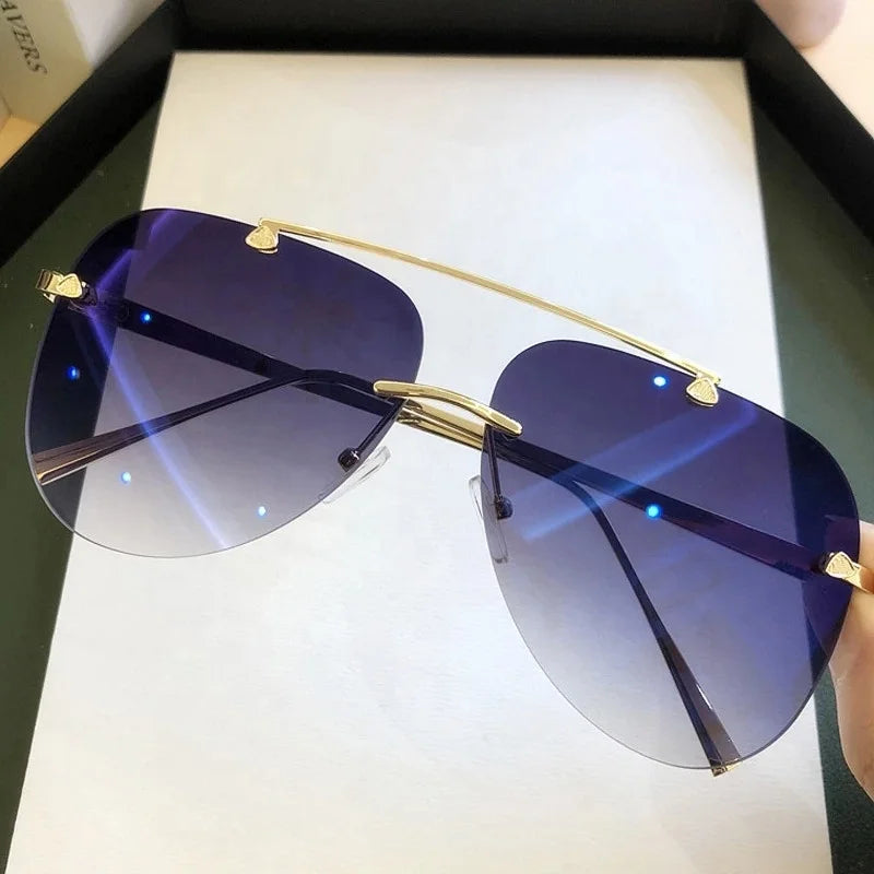 Hot Selling Custom Logo Fashion Luxury Rimless Gradient Sunglasses UV400 Metal Aviation Sunglasses Pilot Sunglasses Men Women