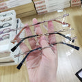Cat Eye Wholesale Men Rimless Metal Fashion Design Optical Frames Eyeglasses for Men 25636