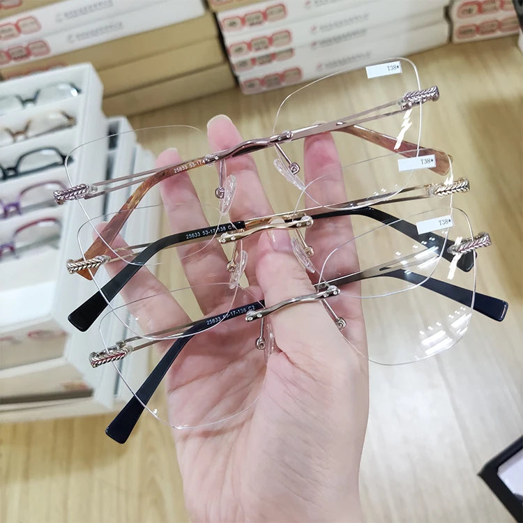 Cat Eye Wholesale Men Rimless Metal Fashion Design Optical Frames Eyeglasses for Men 25636