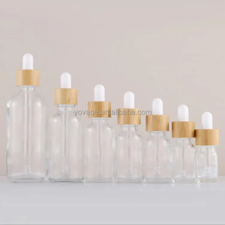 RTS in Stock Eco-friendly Essential Oil 30 ml 30ml 1 Oz Skin Care Serum clear Glass Dropper Bottle with Natural Bamboo Cap