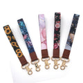 Wholesale Luxury Design Wristband Phone Case Lanyard PU Leather Keychain Polyester Lanyards Strap With Custom Logo