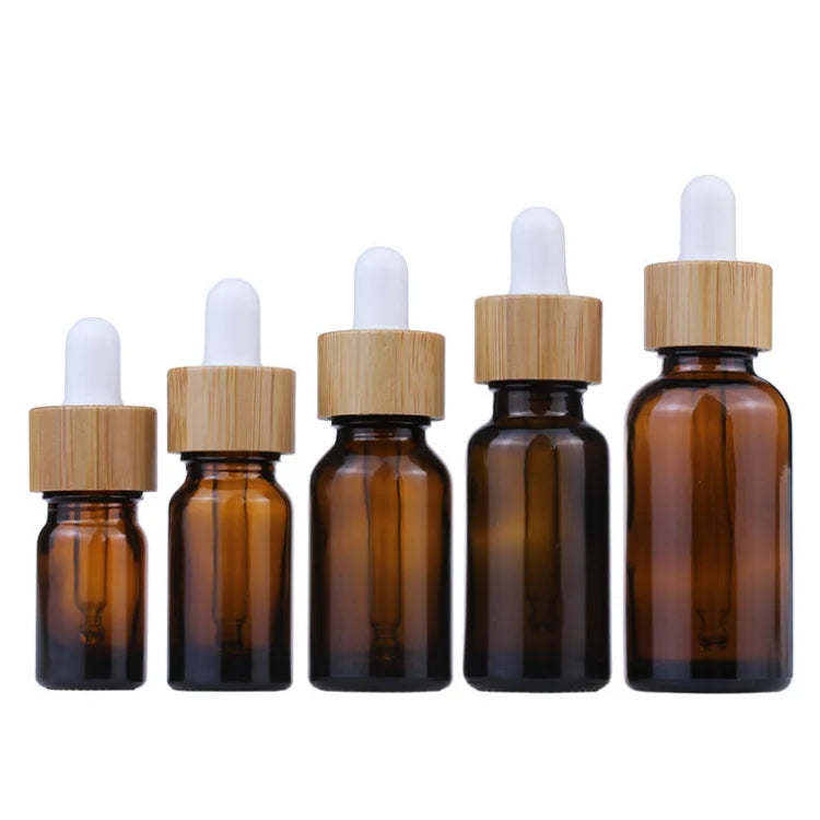 Hot Sale 20ml 30ml 50ml 100ml Dark Brown Amber Essential Oil Glass Container Bamboo Dropper Bottle for Cosmetic Packaging